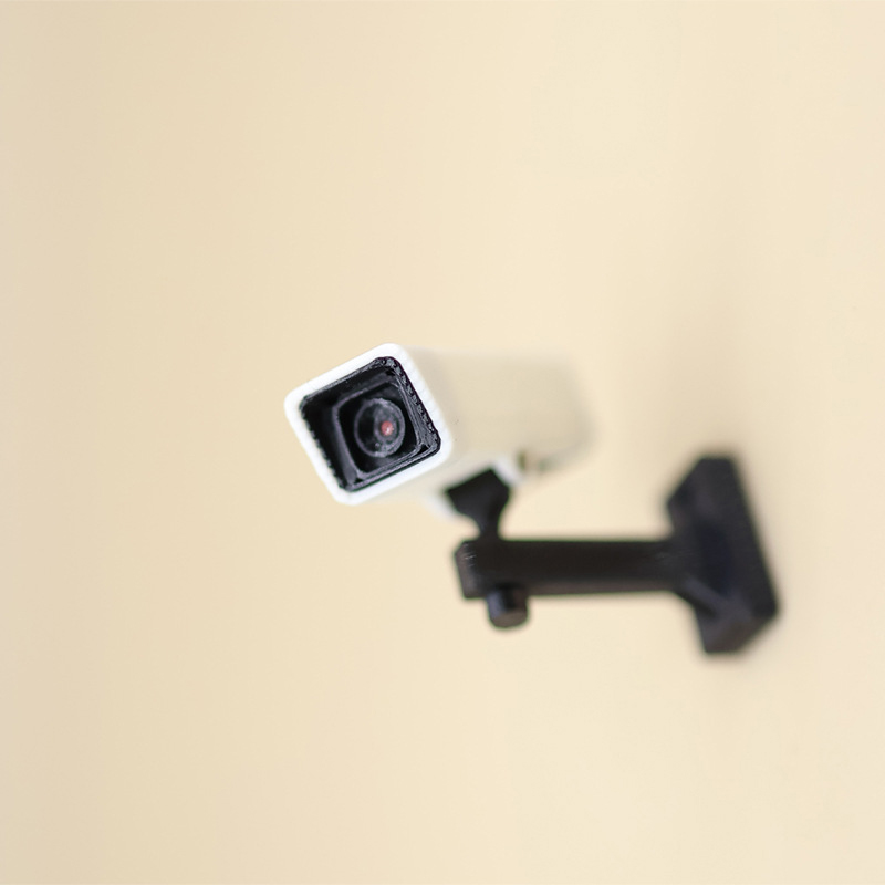 Home Security Cameras - Câmera de Vigilância Miniatura em Escala